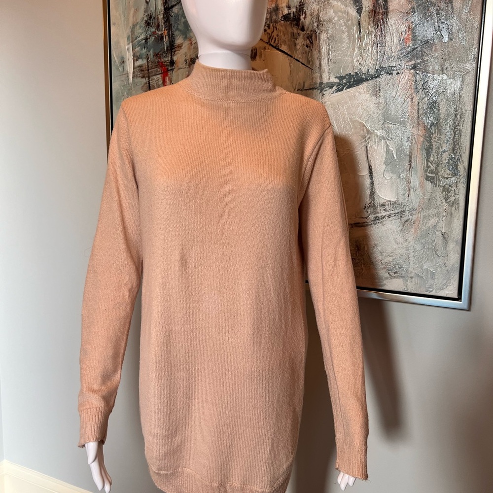 Chico’s, cream colored knit tunic. Size O